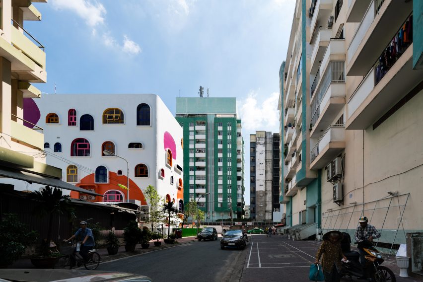 TTC Elite Saigon Kindergarten in by Kientruc O in has a distinctive facade decorated with colourful patches and irregularly shaped windows.