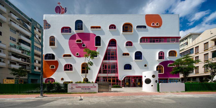 TTC Elite Saigon Kindergarten in by Kientruc O in has a distinctive facade decorated with colourful patches and irregularly shaped windows.
