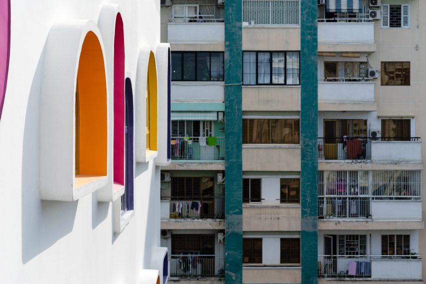 TTC Elite Saigon Kindergarten in by Kientruc O in has a distinctive facade decorated with colourful patches and irregularly shaped windows.