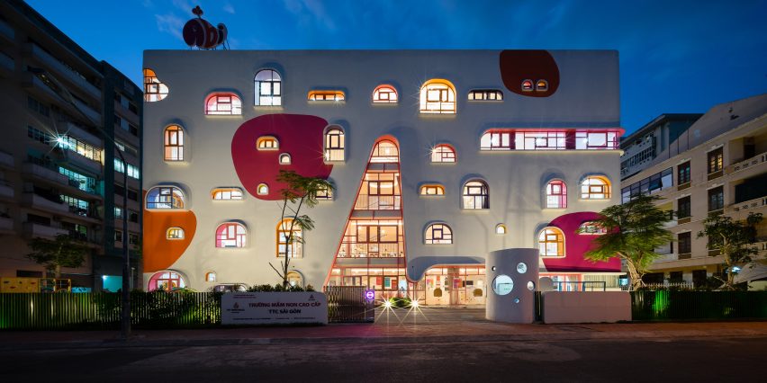 TTC Elite Saigon Kindergarten in by Kientruc O in has a distinctive facade decorated with colourful patches and irregularly shaped windows.