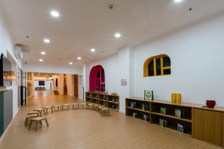 TTC Elite Saigon Kindergarten in by Kientruc O in has a distinctive facade decorated with colourful patches and irregularly shaped windows.