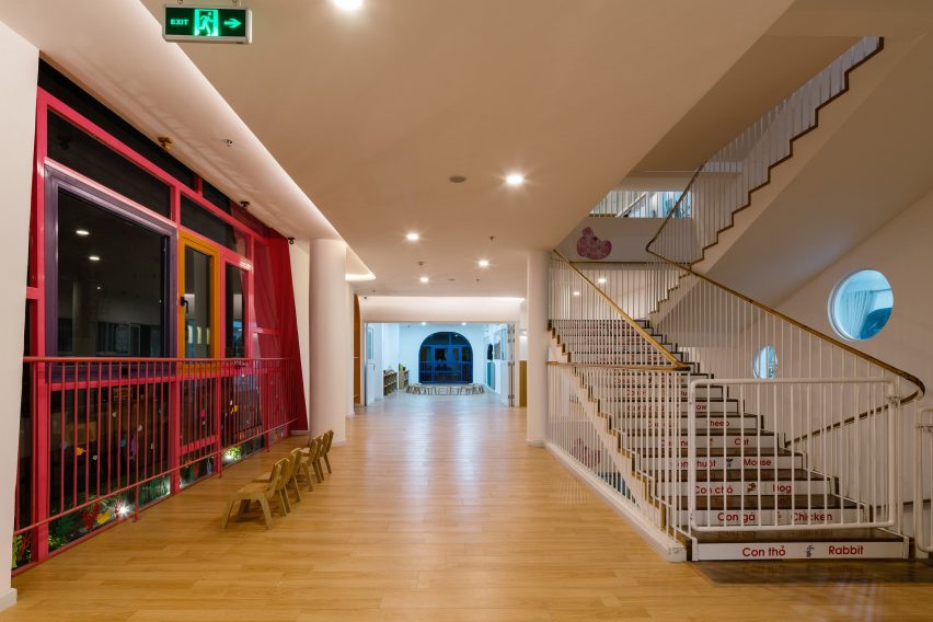 TTC Elite Saigon Kindergarten in by Kientruc O in has a distinctive facade decorated with colourful patches and irregularly shaped windows.
