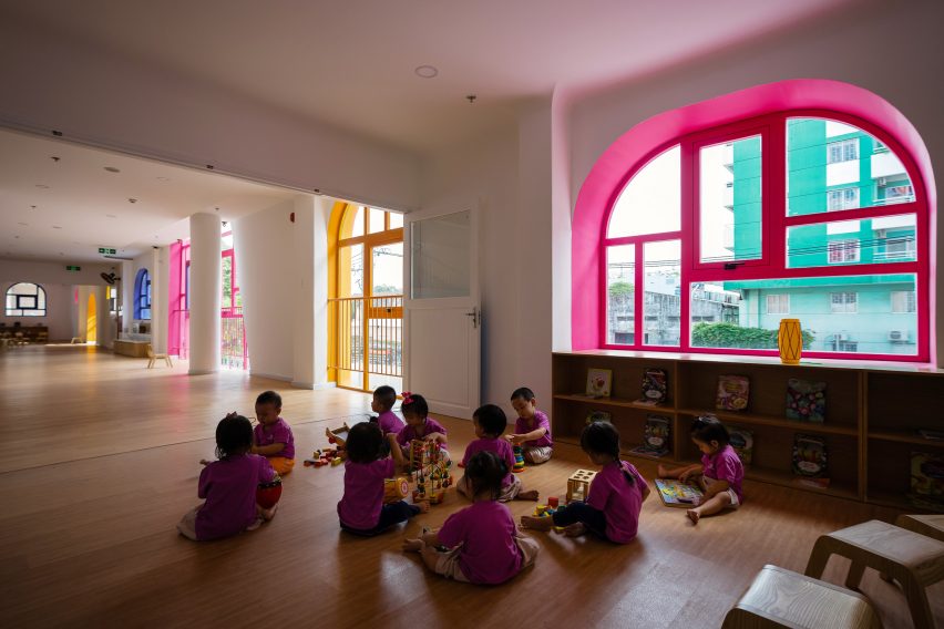 TTC Elite Saigon Kindergarten in by Kientruc O in has a distinctive facade decorated with colourful patches and irregularly shaped windows.