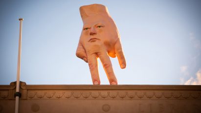 Quasi Ronnie van Hout hand sculpture