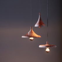 Zhekai Zhang uses waste coffee grounds to create marble effect on Coffire lamps