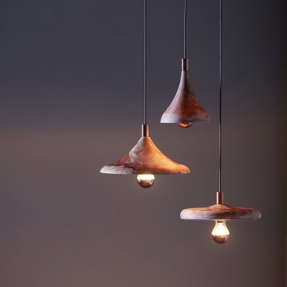 Zhekai Zhang uses waste coffee grounds to create marble effect on Coffire lamps