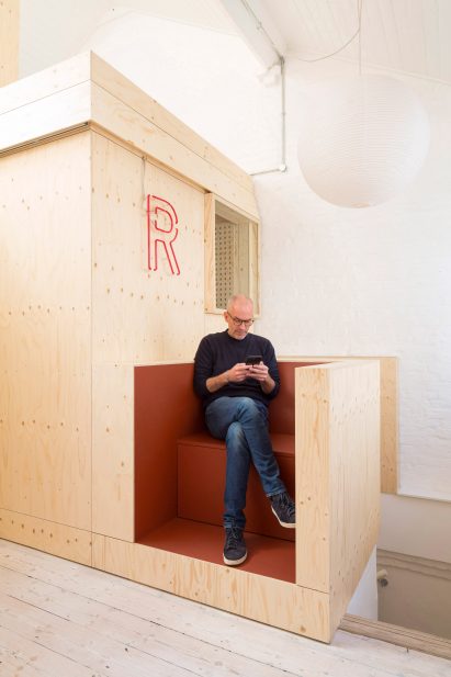 Seating area in Studio Represent wood office by Alder Brisco