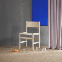 Veneer seat and backrest "drape" over frame of Thomas Bentzen's Soft Chair