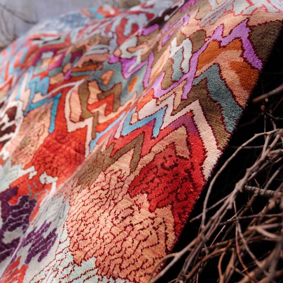 Manju Devi's abstract Aas Pass rug is inspired by rural village life