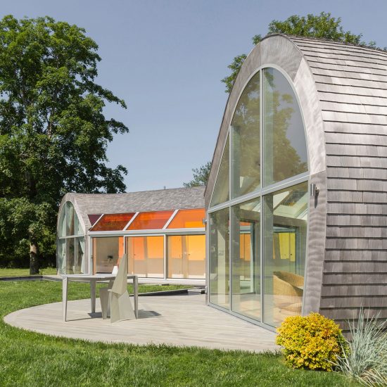 Skylights create rainbow patterns inside cedar-covered Cocoon House by Nina Edwards Anker