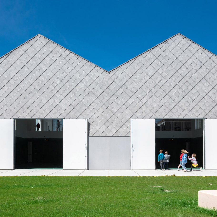 School Zarren with pink concrete stair by Felt in Belgium