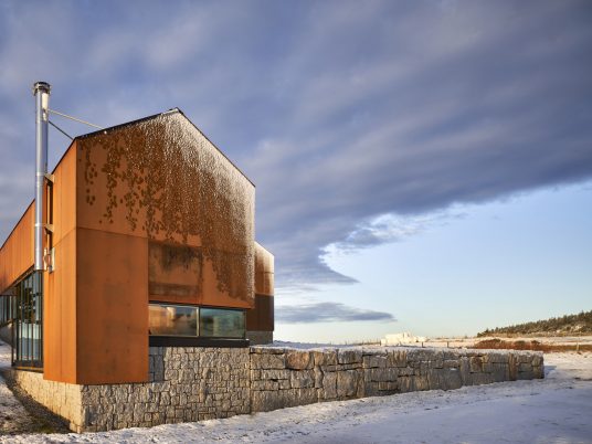 Smith Residence by MacKay-Lyons Sweetapple is a "village" of gabled steel structures