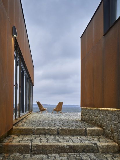 Smith Residence by MacKay-Lyons Sweetapple is a "village" of gabled steel structures