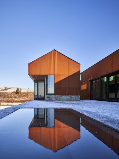 Smith Residence by MacKay-Lyons Sweetapple is a "village" of gabled steel structures