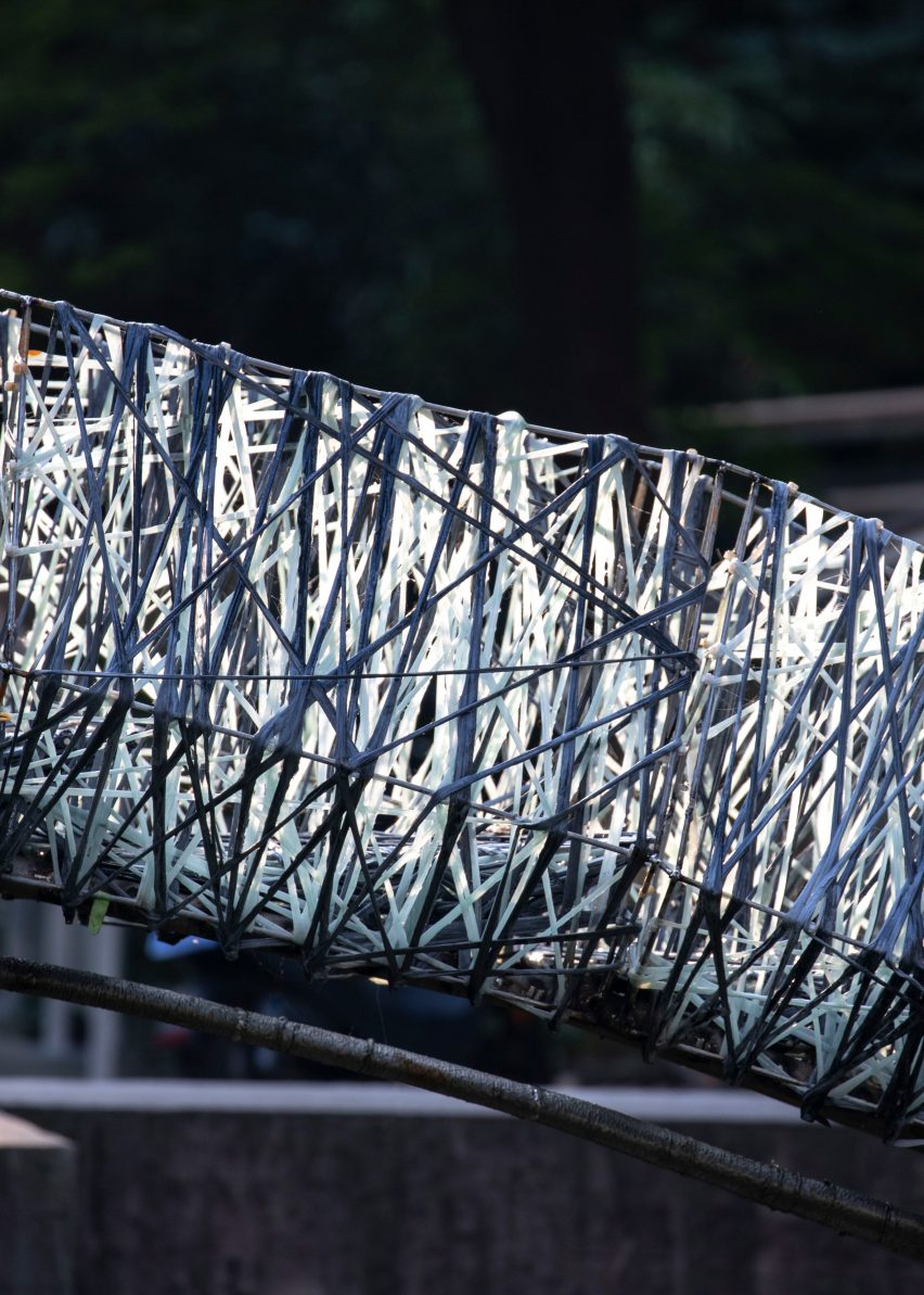 Two robotic fabrication methods entwine to make Tongji University bridge