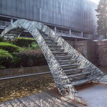 Two robotic fabrication methods entwine to make Tongji University bridge