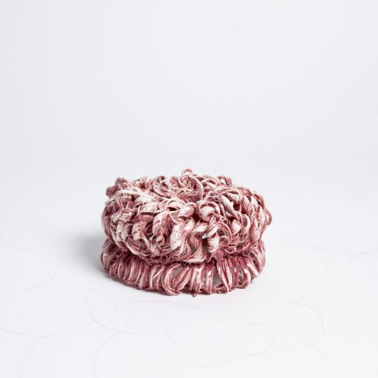 Céline Arnould makes commemorative porcelain bowls from the hair of loved ones