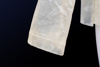 Charlotte McCurdy creates carbon negative raincoat from algae plastic