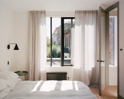 Corner House by 31/44 Architects bedroom