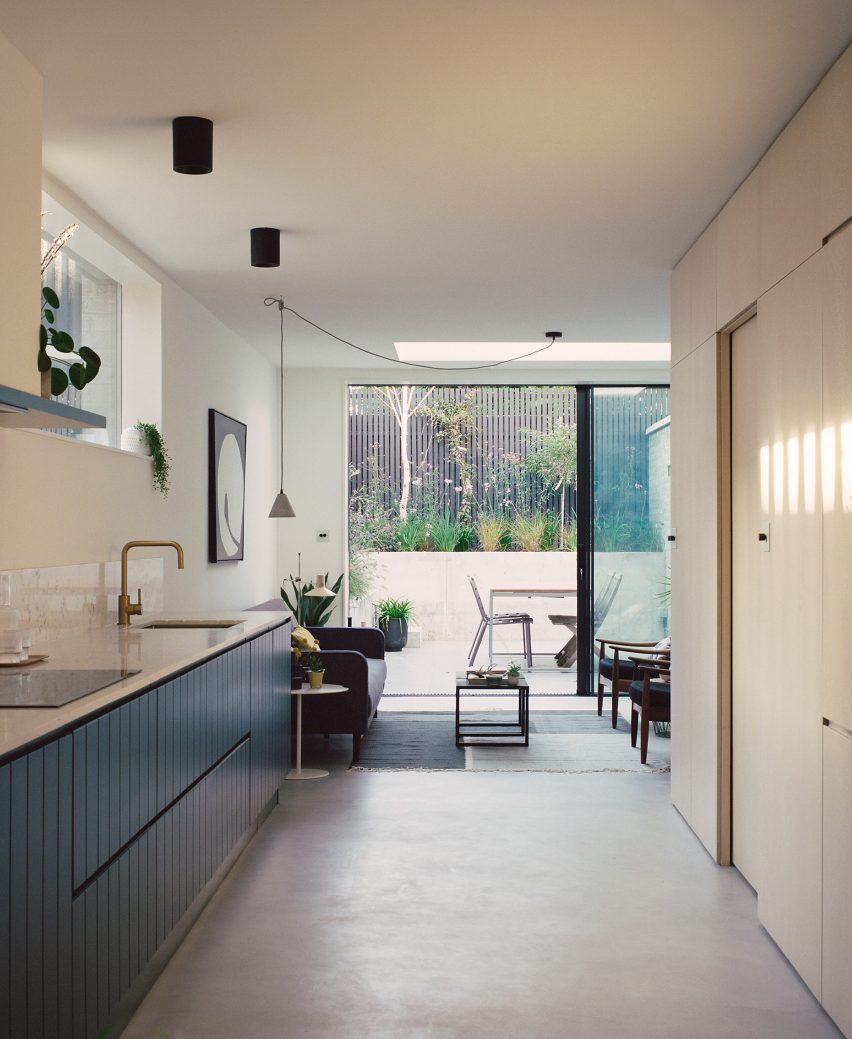 Corner House by 31/44 Architects kitchen