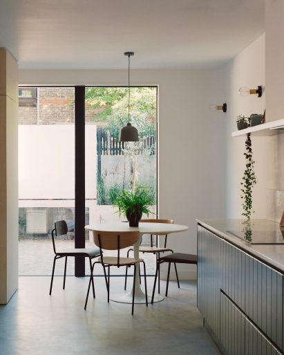 Corner House by 31/44 Architects dining area