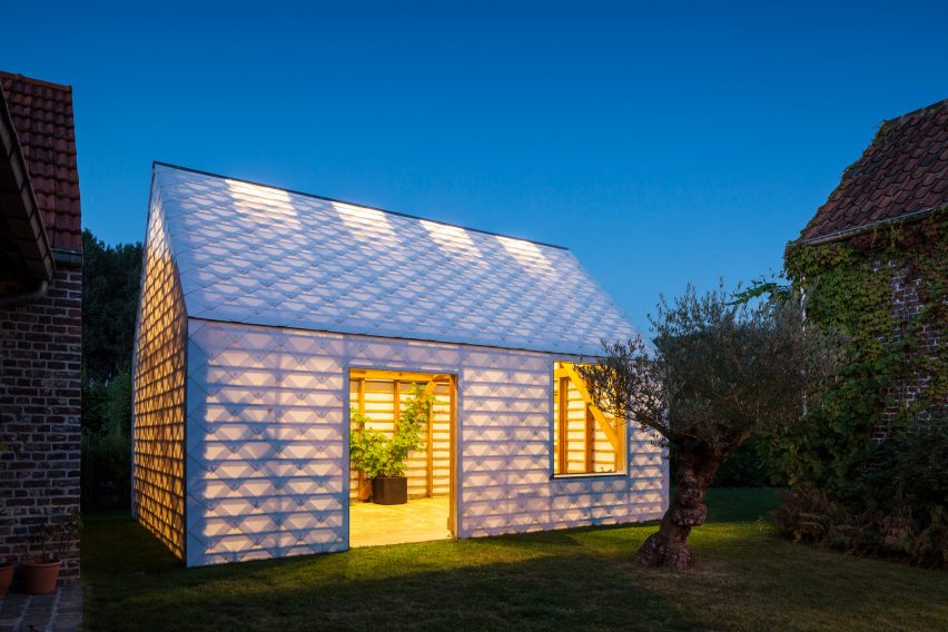 Garden Room by Indra Janda glowing at night