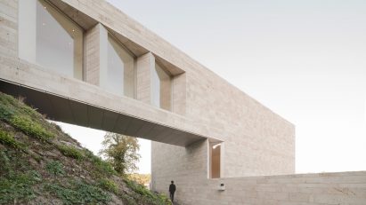 A museum covered in polished travertine tiles