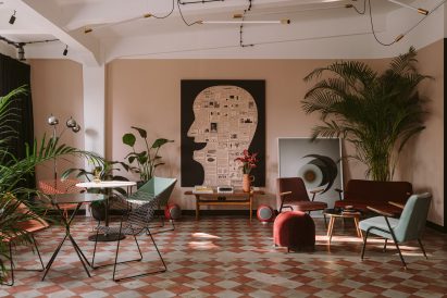 Clay Warsaw offices designed by Mateusz Baumiller with chequerboard flooring