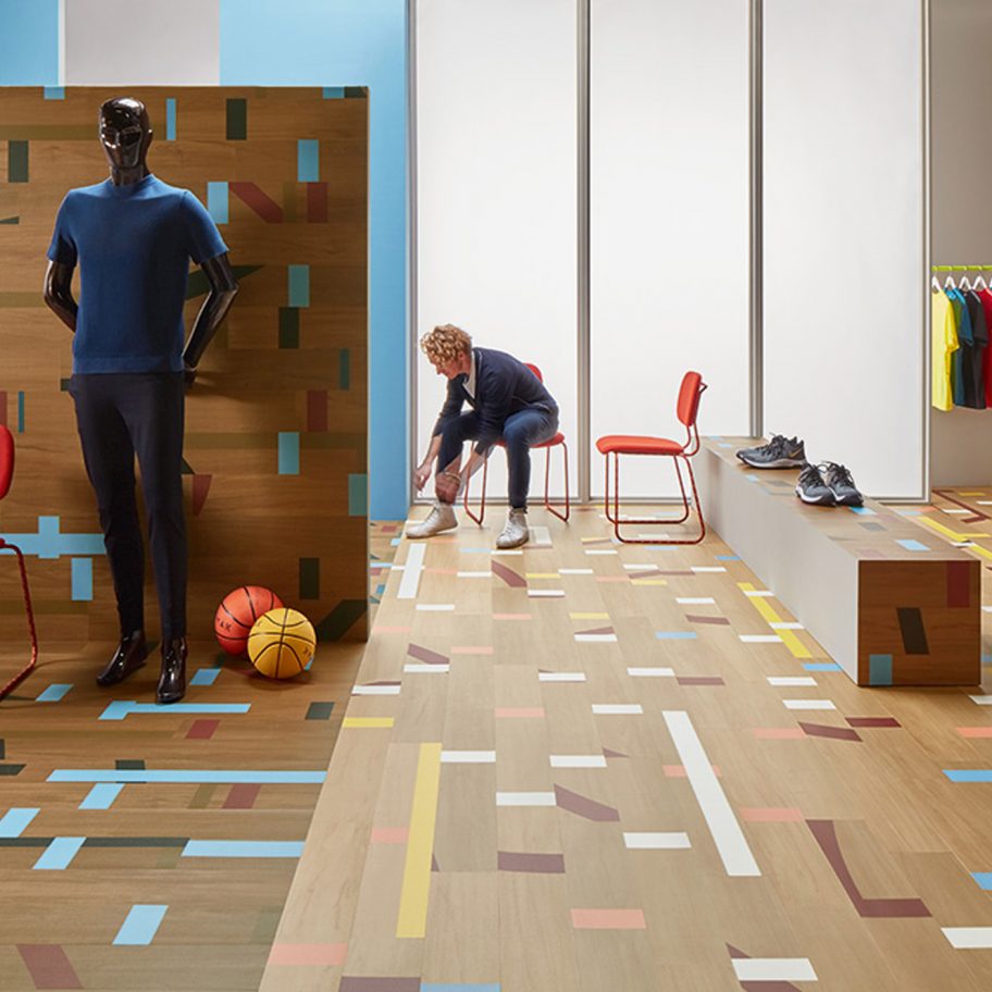 Vinyl Allura tiles mimic the look of a reclaimed gym floor