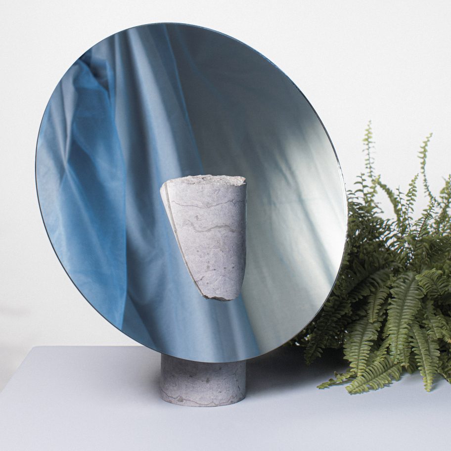 Reflect mirror by Hanna-Liisa Haukka in limestone