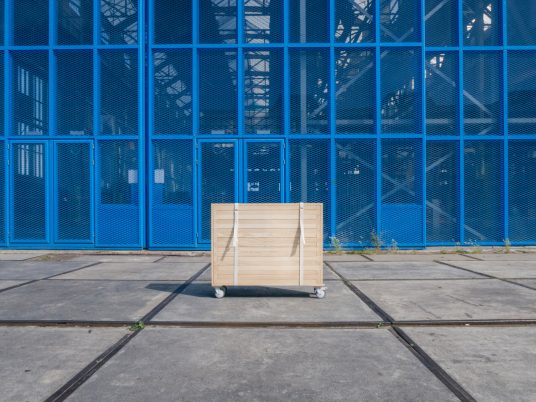 NEST moving crate opens up into a minimal home kit for Generation Rent