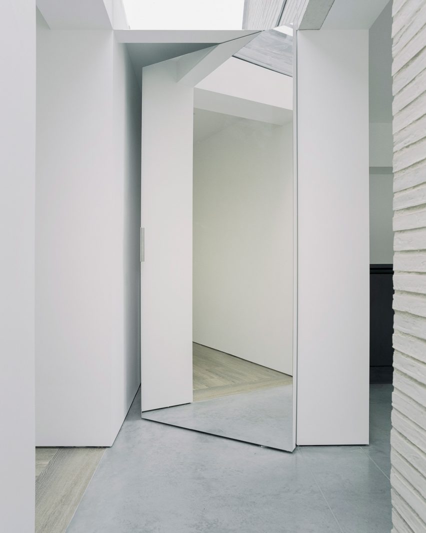 Over The Edge minimalist house by Jonathan Burlow mirrored door