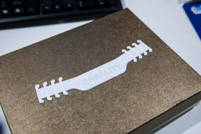 3D-printed face mask buckle by Creality