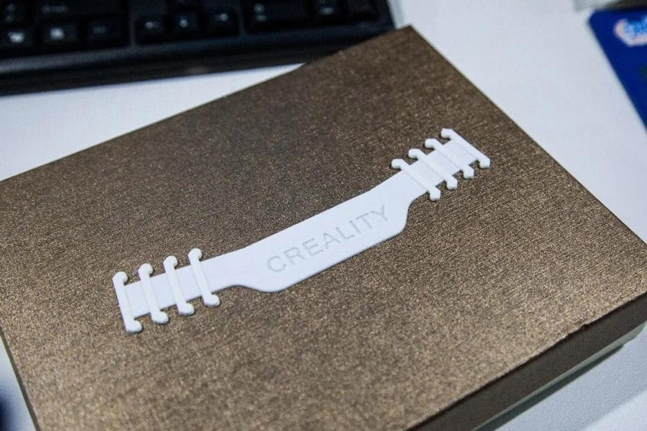 3D-printed face mask buckle by Creality