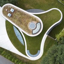 House in Coombe Park by Eldridge London grass roof