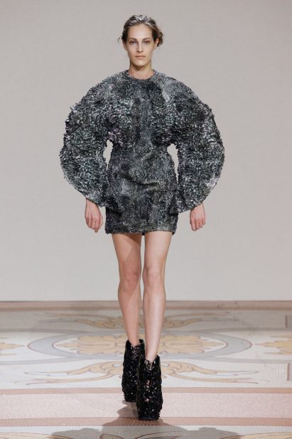 Iris van Herpen collaborated with Dutch designer Jólan van der Wiel on a series of magnetic dresses made from resin mixed with iron fillings