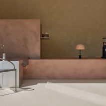 Monolithic plaster counter centres La Petite cafe in Abu Dhabi