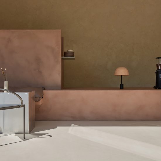 Monolithic plaster counter centres La Petite cafe in Abu Dhabi