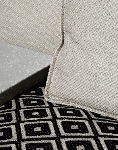 Philippe Starck creates outdoor furniture that folds in half to ward off rain