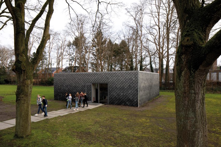 Overtreders W and Bureau SLA Music Pavilion at Sint-Oelbert Gymnasium with Pretty Plastic cladding by Overtreders W and Bureau SLA