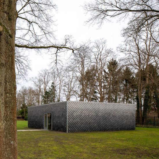 Overtreders W and Bureau SLA Music Pavilion at Sint-Oelbert Gymnasium with Pretty Plastic cladding by Overtreders W and Bureau SLA