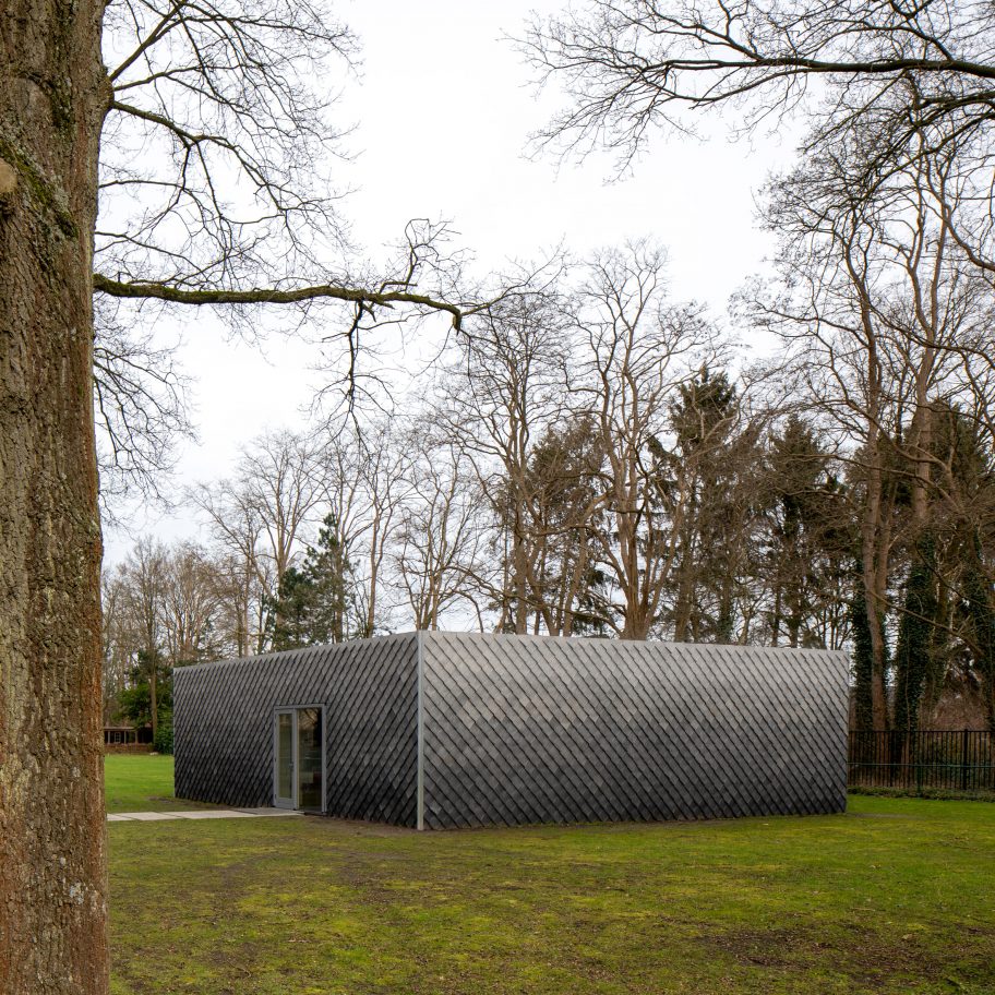 Overtreders W and Bureau SLA Music Pavilion at Sint-Oelbert Gymnasium with Pretty Plastic cladding by Overtreders W and Bureau SLA