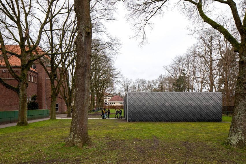 Overtreders W and Bureau SLA Music Pavilion at Sint-Oelbert Gymnasium with Pretty Plastic cladding by Overtreders W and Bureau SLA