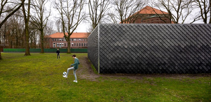 Overtreders W and Bureau SLA Music Pavilion at Sint-Oelbert Gymnasium with Pretty Plastic cladding by Overtreders W and Bureau SLA