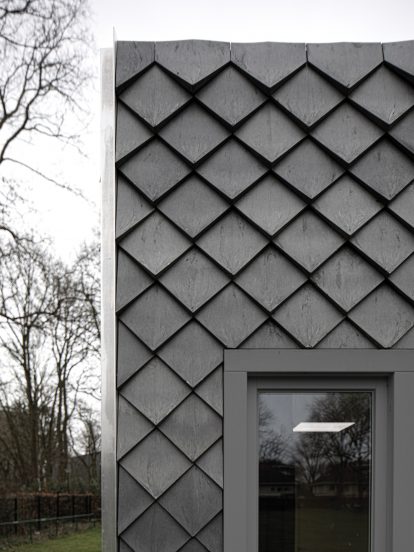 Overtreders W and Bureau SLA Music Pavilion at Sint-Oelbert Gymnasium with Pretty Plastic cladding by Overtreders W and Bureau SLA