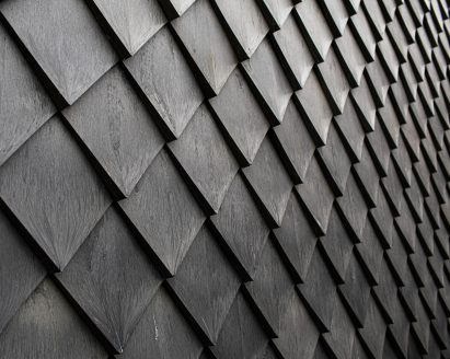 Overtreders W and Bureau SLA Music Pavilion at Sint-Oelbert Gymnasium with Pretty Plastic cladding by Overtreders W and Bureau SLA