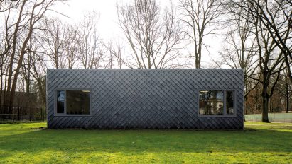 Overtreders W and Bureau SLA Music Pavilion at Sint-Oelbert Gymnasium with Pretty Plastic cladding by Overtreders W and Bureau SLA