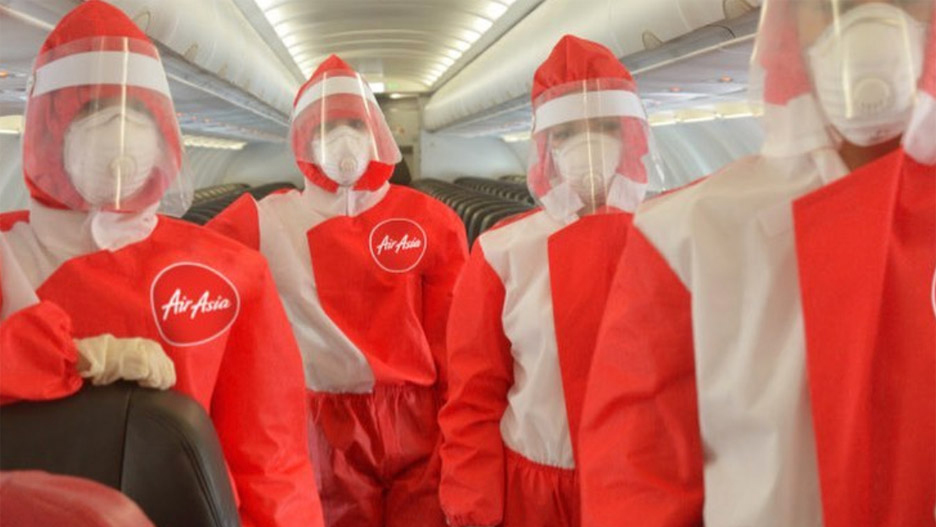 Puey Quinones designs PPE cabin crew uniform for AirAsia