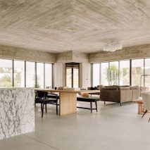 Triple-perspective living room forms core of Casa Meco in Portugal