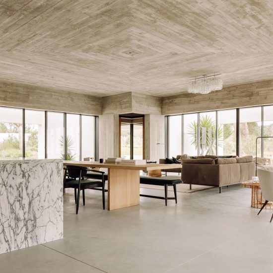 Triple-perspective living room forms core of Casa Meco in Portugal